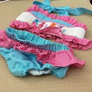 Playful Pink and Blue Ruffled Bikini with Bow Accent